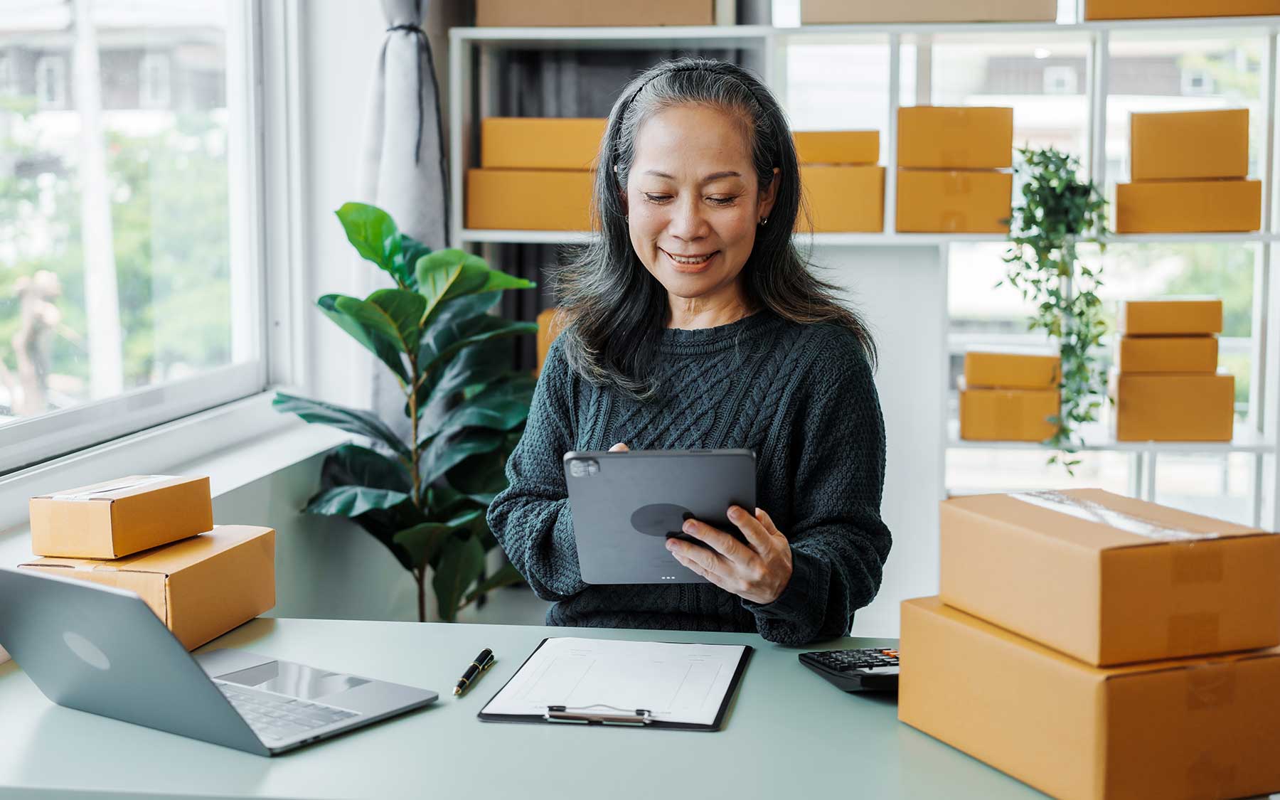 Small business owner using an ipad